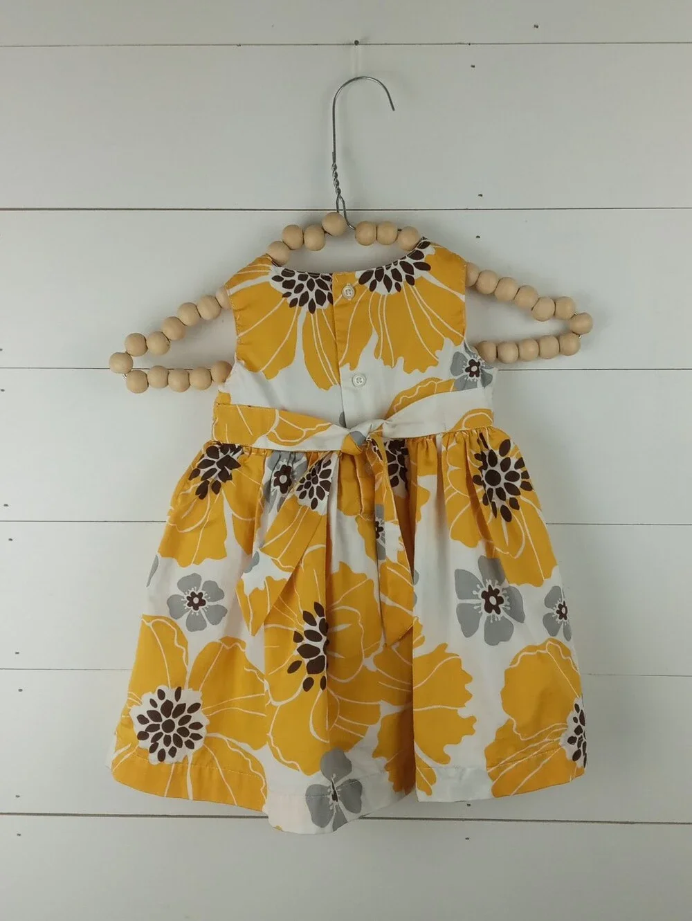 Carter’s girls size 9 mos white and yellow large floral design dress buttons
